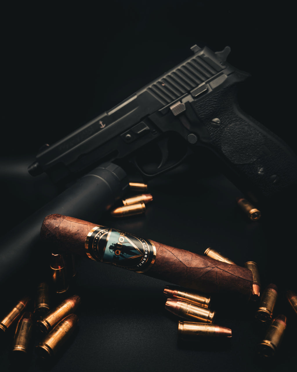 P226 Pistol, Tenebrous Aequor cigar, and 9mm bullets on a dark background